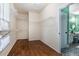 Large walk-in closet with custom shelving and hardwood flooring, providing ample storage space at 2063 Willow Chase Ct, Tucker, GA 30084