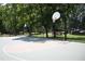 The basketball court features dual hoops with a court featuring unique color blocking at 2210 Park Walke Dr, Alpharetta, GA 30009