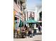 A lively street scene featuring restaurants with outdoor seating, creating a vibrant dining atmosphere at 2285 Park Walke Dr, Alpharetta, GA 30009