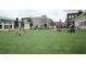 Large town green area surrounded by restaurants and apartments with plenty of space for community activities at 2285 Park Walke Dr, Alpharetta, GA 30009