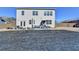 Large backyard featuring a spacious lawn and patio at 4825 Odum View Ln, Cumming, GA 30040