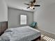 Bright bedroom with a bed and a window at 4825 Odum View Ln, Cumming, GA 30040