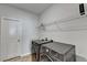 Well-equipped laundry room with modern washer and dryer units for convenience at 4825 Odum View Ln, Cumming, GA 30040