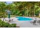 Aerial view of multi-Gathering property surrounded by lush trees and ample parking at 6487 Northridge Way, Morrow, GA 30260