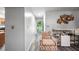 Hallway with a bar and decorated sitting chair at 6487 Northridge Way, Morrow, GA 30260