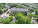Aerial view of apartment building surrounded by mature trees, showcasing its ideal neighborhood location at 840 United Ave # 113, Atlanta, GA 30312