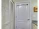 Bathroom featuring a white door, closet, and granite countertop at 840 United Ave # 113, Atlanta, GA 30312
