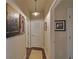 Hallway showcasing modern artwork and multiple doors leading to various rooms at 840 United Ave # 113, Atlanta, GA 30312