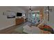 Cozy living room with hardwood floors, sectional sofa, media console and a balcony at 840 United Ave # 113, Atlanta, GA 30312