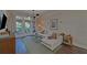 Comfortable living room with a plush sectional sofa, access to a balcony, and modern decor at 840 United Ave # 113, Atlanta, GA 30312