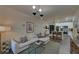 Open-concept living area with modern decor, hardwood floors, leading into a well-equipped kitchen at 840 United Ave # 113, Atlanta, GA 30312