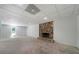 Spacious basement with unique river rock fireplace and a walkout door at 1460 Bakers Bridge Rd, Douglasville, GA 30134