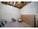Storage room in the basement with exposed insulation on the walls at 1460 Bakers Bridge Rd, Douglasville, GA 30134
