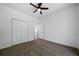 This is a bright bedroom featuring a closet and an open doorway at 1460 Bakers Bridge Rd, Douglasville, GA 30134