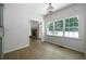 Bright breakfast nook adjacent to the kitchen, with access to the living room at 1460 Bakers Bridge Rd, Douglasville, GA 30134