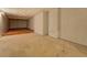 Unfinished basement offers a blank canvas with concrete floors and walls, ready for customization at 2690 Ross Rd, Snellville, GA 30039