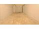 Spacious unfinished basement, ready for renovation with garage door and concrete foundation at 2690 Ross Rd, Snellville, GA 30039