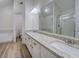 Main bathroom features granite countertops, dual sinks, and a separate shower and tub at 2690 Ross Rd, Snellville, GA 30039