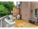Inviting deck space featuring outdoor furniture and a peaceful view of the surrounding greenery at 3745 Meeting St, Duluth, GA 30096