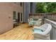 Relaxing deck with outdoor seating, a table for dining, and a private wooded view at 3745 Meeting St, Duluth, GA 30096