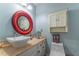 Bathroom with vessel sink, updated vanity, and stylish fixtures at 3745 Meeting St, Duluth, GA 30096