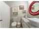 Cozy bathroom featuring modern sink, cabinetry, and a bathtub with a shower curtain at 3745 Meeting St, Duluth, GA 30096