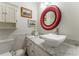 Bathroom featuring a modern sink, cabinetry, decorative mirror, and updated faucet and fixtures at 3745 Meeting St, Duluth, GA 30096