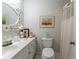 Bathroom featuring a white vanity, decorative mirror, and bathtub with a shower curtain at 3745 Meeting St, Duluth, GA 30096