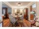Elegant dining room featuring hardwood floors, a chandelier, and classic furnishings at 3745 Meeting St, Duluth, GA 30096