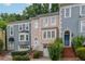 Charming townhouses boast colorful facades, driveways, and well-maintained landscaping at 3745 Meeting St, Duluth, GA 30096