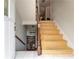 Inviting foyer with carpeted stairs, tile flooring, and a view into the home's interior at 3745 Meeting St, Duluth, GA 30096