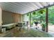 Relaxing covered patio area with outdoor seating, grill, and a bathtub at 3745 Meeting St, Duluth, GA 30096