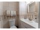 Well-lit half-bathroom with clean white fixtures and tastefully decorated walls with modern accents at 3745 Meeting St, Duluth, GA 30096