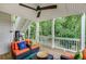 Cozy covered porch featuring outdoor seating and a wooded view, perfect for relaxation at 41 Wexford Nw Cir, Cartersville, GA 30121