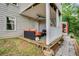 Inviting back porch with comfortable seating, providing an outdoor living space adjacent to the home at 41 Wexford Nw Cir, Cartersville, GA 30121