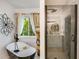 Bright bathroom features a soaking tub, window, and a glass-enclosed shower with marble surround at 41 Wexford Nw Cir, Cartersville, GA 30121