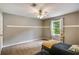 Bedroom featuring a ceiling fan, and bright natural light from the window at 41 Wexford Nw Cir, Cartersville, GA 30121