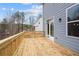 Exterior view of deck with wooden railings and view of the backyard at 109 Laurelwood Ln, Dallas, GA 30157