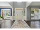 Bright foyer with hardwood floors, soaring ceilings, and a large window at 1680 Laleiah Dr, Cumming, GA 30041
