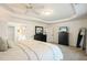 Large main bedroom with sitting area, large windows, and ensuite bathroom at 1680 Laleiah Dr, Cumming, GA 30041