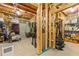 Unfinished basement with visible framing, offering lots of potential for storage and customization at 309 Mcdaniel Pl, Canton, GA 30115