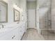Elegant bathroom with double vanity, spacious walk-in shower, and modern fixtures at 309 Mcdaniel Pl, Canton, GA 30115