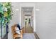Welcoming entryway featuring shiplap walls, a bench with pillows, and stylish decor at 309 Mcdaniel Pl, Canton, GA 30115