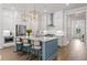 Bright kitchen featuring stainless steel appliances, white cabinets, and modern fixtures at 309 Mcdaniel Pl, Canton, GA 30115