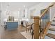 Charming kitchen featuring stainless appliances, an island with bar stool seating, and bright lighting at 309 Mcdaniel Pl, Canton, GA 30115