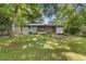Cozy home featuring a nice backyard and wooden porch, perfect for outdoor relaxation at 4345 Sasanqua Ct, Tucker, GA 30084