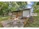 Backyard and patio with a wooden porch that offers a tranquil outdoor living experience at 4345 Sasanqua Ct, Tucker, GA 30084