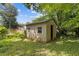 Property includes a functional outdoor storage shed nestled in a green and leafy backyard at 4345 Sasanqua Ct, Tucker, GA 30084