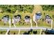 Aerial view of homes with well-maintained yards in a picturesque neighborhood with tree-lined streets at 140 Discovery Lake Dr, Fayetteville, GA 30215