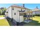 Spacious backyard with a covered deck, providing an ideal spot for outdoor relaxation and entertaining at 140 Discovery Lake Dr, Fayetteville, GA 30215